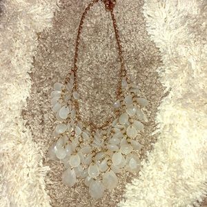 Gold and clear stone necklace